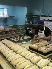 Owner Ted Pearson prepping for the bakery's day (photo: Planet Bakery)