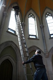 Public Energy artistic producer Bill Kimball and artist Robert Edmondson rigging up the works for Robert's interactive kinetic sculpture in the chapel (photo: Paul Oldham)