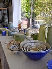 Exceptional and functional ceramic works by Thomas Aitken and Kate Hyde look beautiful sitting is this sunny window looking out on the landing (photo courtesy of Christy Haldane at Proximity Fine Art)