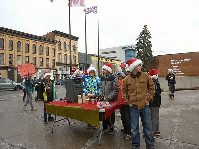 The class set up outside Peterborough Square and ready to spread some Christmas cheer