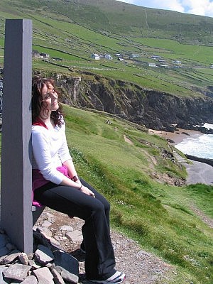 Megan relaxing on a bench in Ireland