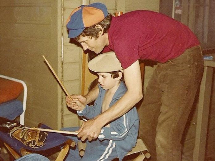The Band's Levon Helm teaching drum licks to his godson Jerome Avis, who will be performing with The Last Waltz (photo: Jerome Avis)