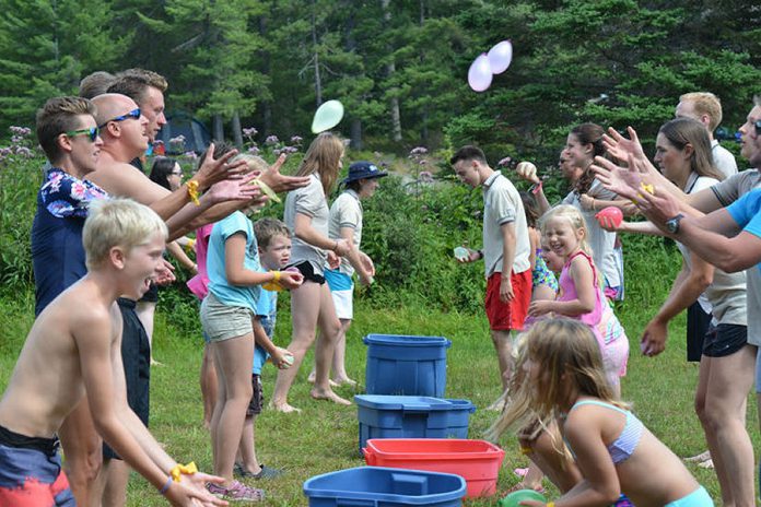 Playing with water balloons at Grundy Lake Provincial Park (photo: Ontario Parks)