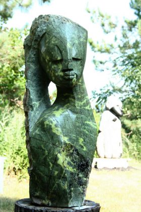 "Confident Woman", a leopard stone sculpture by Walter Mariga (photo: Shannon Taylor)