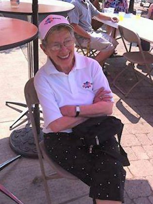 Erica was a strong supporter of the business community, including the Peterborough DBIA. Here she is as a judge at the 2015 Ribfest, watching as writer Paul Rellinger (not pictured) eat ribs (photo courtesy Peterborough DBIA)