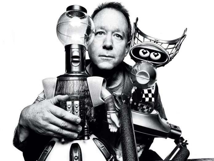 Mystery Science Theater 3000 creator and initial host Joel Hodgson with Tom Servo and Crow T. Robot, which were created by Hodgson and fashioned out of common household objects (photo: Platon)