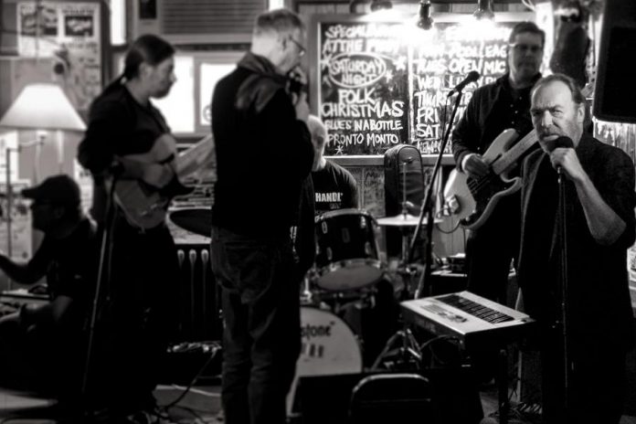 Phil Marshall performing with The Blue Tones at the Blues Jam at The Pig's Ear Tavern. Held on the third Saturday afternoon of each month, the Deluxe Blues Jam collects donations from the audience for PMBA and The Piggy's co-owner John Punter also donates a a portion of bar sales to the organization. (Photo: Phillip Connor)