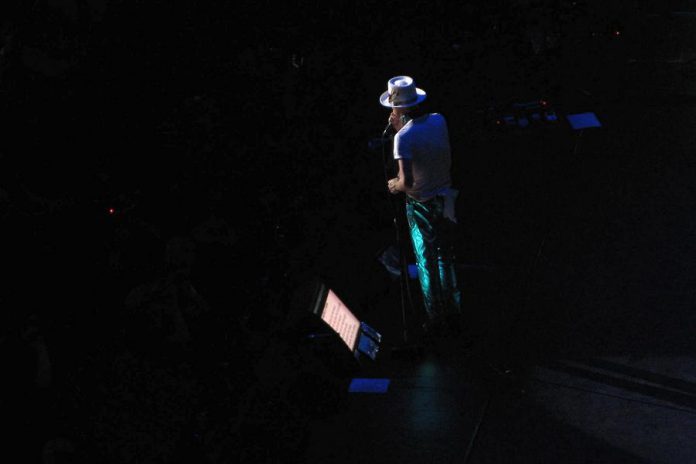 Gord Downie talking before a tune (photo: Alisha Embury)