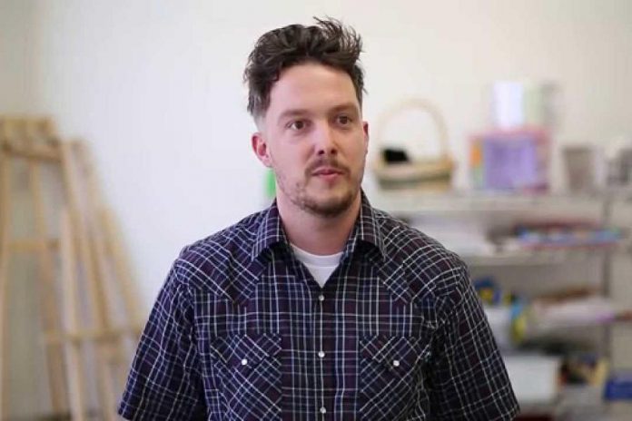 Artist Alex Bierk, who will be installing his cloud mural on the east side of the HELP Paralegal at 114 Simcoe Street in downtown Peterborough (photo: Art Gallery of Peterborough / YouTube)