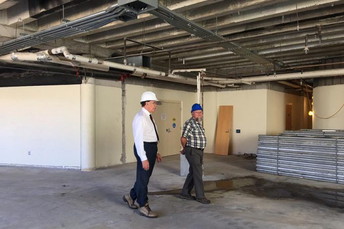 City of Peterborough Mayor Daryl Bennett and community services director Ken Doherty tour the Alymer Street renovation site on Thursday, September 9  (photo: Peterborough Public Library)