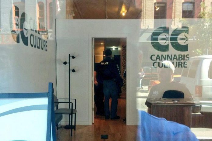 Members of Peterborough Police Drug Unit execute a search warrant on September 15 at Cannabis Culture at 382 George Street in downtown Peterborough. Police arrested owner Richard Standen and employee Maranda Gallant. (Photo: Facebook video)