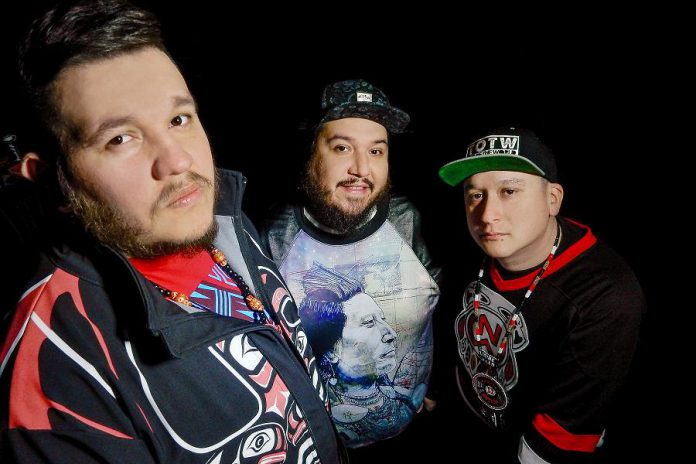 Bear Witness (middle) of A Tribe Called Red (publicity photo)