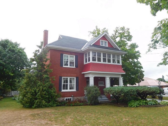 Recently inspected: this beautiful red brick home with an upstairs sunporch in Hastings. (Photo: David Sharman)