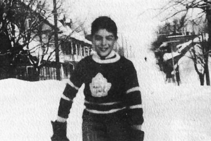 A 10-year-old Roch Carrier in the Toronto Maple Leafs sweater that spawned his classic children's story The Hockey Sweater, which Bob Gainey will narrate at the December 10th concert. The photograph was taken by Carrier's mother in his hometown of Sainte-Justine-de-Dorchester in Quebec. (Photo: Library and Archives Canada)