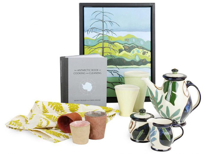 A sample of a few lovely items from the Art Gallery of Peterborough Gift Shop, including a lovely Indaba wholesale napkin, Wendy Trusler's Antarctic Book of Cooking and Cleaning, pottery by Beth McCubbin, Kate Hyde and Thomas Aitken, and Monica Johnston, and a painting by Leanne Baird (photo courtesy of The Art Gallery of Peterborough)