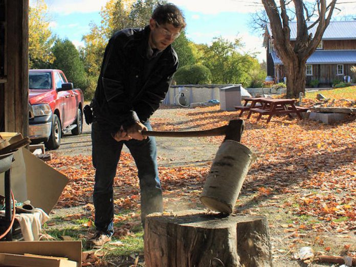 Tom Doughty splits birch logs in order to create the blanks (photo courtesy of David Fry)