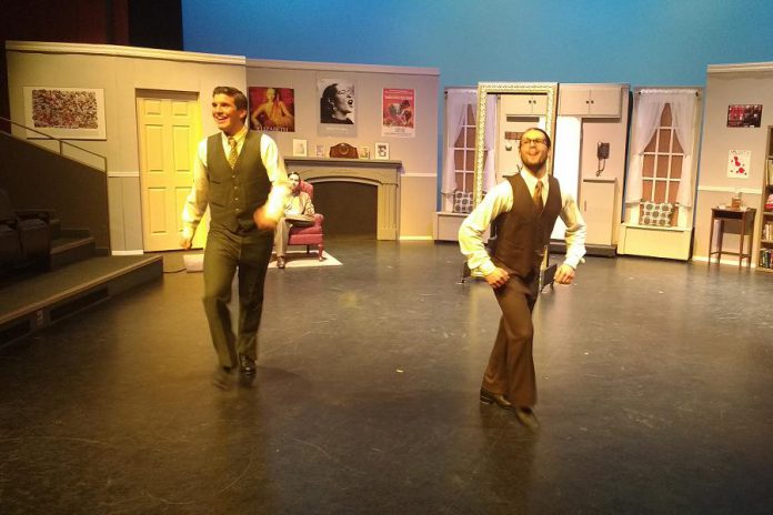 Kristian Paschalis as Robert Martin and Liam Kaller as George, with Braeson Agar as The Man in the Chair in the background, during the dance highlight of the night "Happy Feets" (photo: Sam Tweedle / kawarthaNOW)