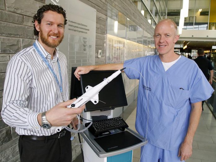 Jeff Dunlop (Regional Cardiac Care Coordinator) and Dr. Warren Ball (Interventional Cardiologist and Head of Division, Cardiology) display PRHC's rotablator, a diamond-tipped instrument that is used to remove blockages preventing angioplasties. The rotablator was entirely funded through community donations to the PRHC Foundation.