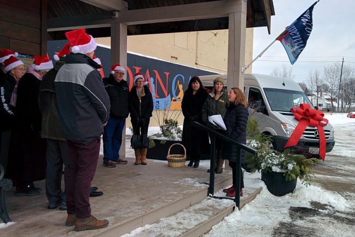 Carolyn Hyslop, General Manager of The Canadian Canoe Museum (right), thanks community supporters for the new van, which was unveiled in the parking lot at the museum's Monaghan Road location (photo: Bruce Head / kawarthaNOW)