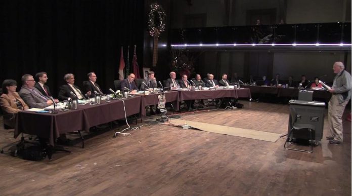 "What we are getting, particularly with this PDI vote, is elitist governing." Roy Brady, chair of the local chapter of the Council of Canadians, speaks to city council. (Photo: City of Peterborough)