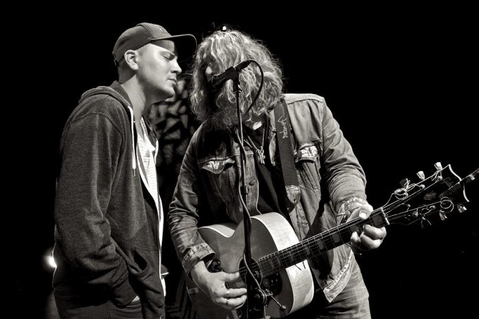 Thompson and Tom Wilson performing in concert. "There's something about sharing a mic with your kid." (Photo courtesy of Tom Wilson)