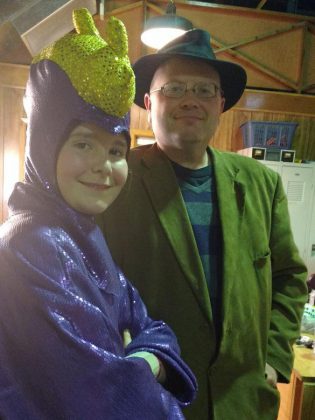 Samuelle Weatherdon, who plays Mortimer the Dragon, with Sam Tweedle (photo: Sam Tweedle / kawarthaNOW)
