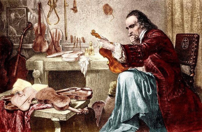 A romanticized print of Italian luthier Antonio Stradivari (1644-1737) examining an instrument. (Photo: Wikipedia)