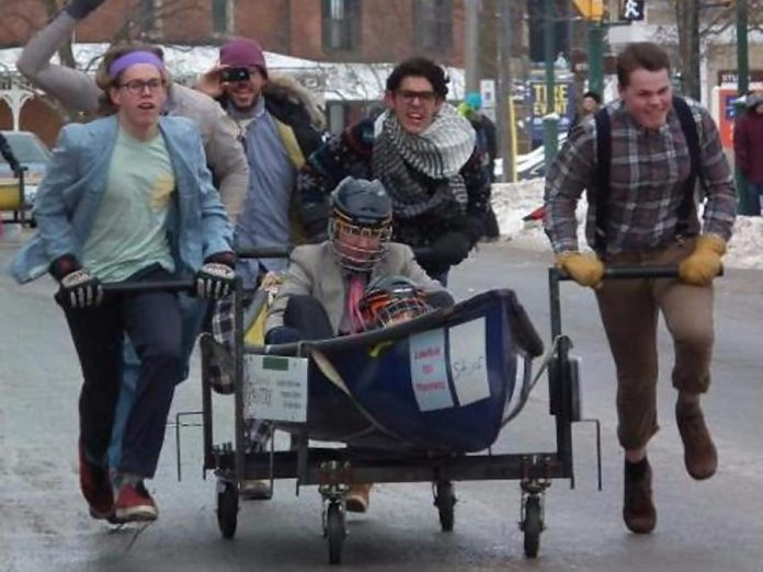 Racing down Queen Street in Lakefield during the Polar Paddle