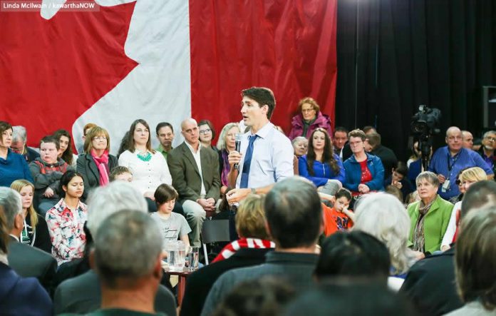 Prime Minister Trudeau addressing the crowd of 400 mostly pro-Liberal audience members at the Evinrude Centre in Peterborough  (photo: Linda McIlwain / kawarthaNOW)