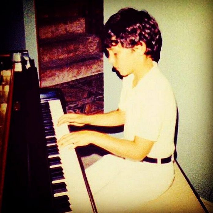 A very young Royal Wood at the piano in his Lakefield family home. Named after his great grandfather Royal Rufus Wood (who was an avid amateur musician), Royal began playing piano by ear at the age of four and started lessons at age eight. (Photo: Royal Wood / Facebook)