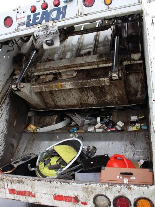 Residents fill a garbage truck with unwanted items at the last City of Peterborough Environment Day. All too often we deem things that are broken as garbage. If it can't be recycled, try repairing items to give them another life and keep them out of landfill.