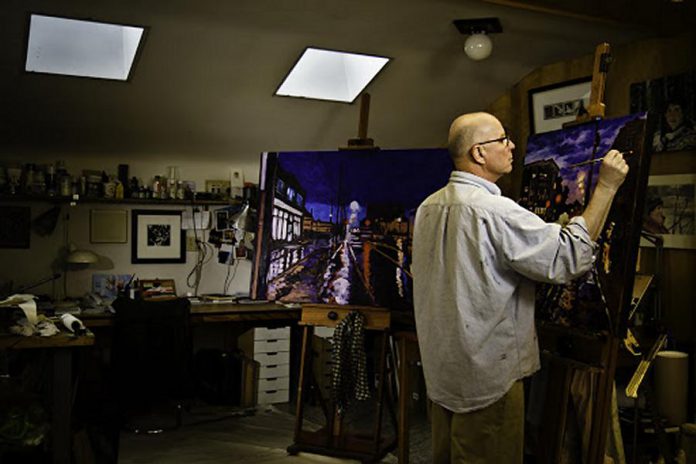 Painter Rob Neizen at work in his studio (photo courtesy of Mike Taylor)