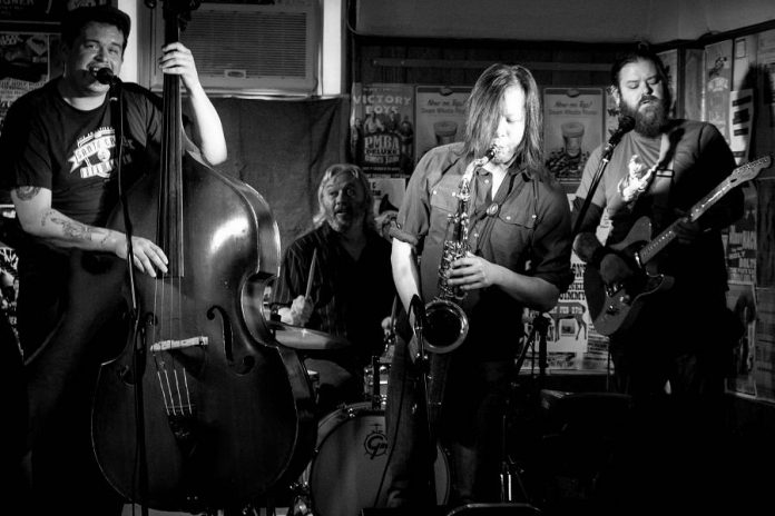 Rob Foreman, Alan Black, Jimmy Wong, and Clayton Yates jamming for a good cause this year at the Deluxe Blues Jam at The Pig's Ear (photo: SLAB Productions)