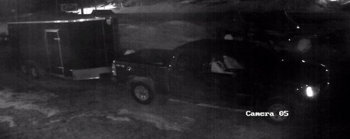 Suspects in this black pickup truck were captured on security footage towing an enclosed black trailer, one of several items of equipment stolen from Tucker's Marine in Apsley overnight on March 10
