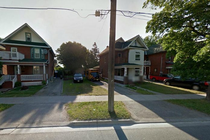 There's not much curb appeal to the  "residential apartment", which is located behind that school bus. (Photo: Google)