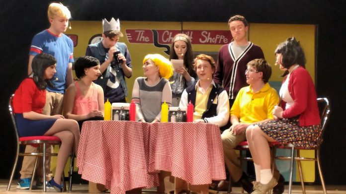 Back to front: Colton Beale as Moose Mason, Thomas Bodrug as Jughead Jones, Sarah Daye as Ginger Lopez, Matt Campbell as Reggie Mantel, Alivia Buchan as Veronica Lodge, Antje Kroes as Midge Klump, Samantha Pickard as Betty Cooper, Jacob Howan as Archie Andrews, Issac Martin as Dilton Doily, and Aiden McDonald as Ethel Muggs. (Photo: Sam Tweedle / kawarthaNOW)