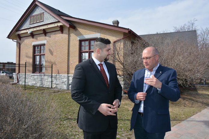 Waleed Dabbah talks business with Stuart Harrison. Waleed recently brought a piece of Hampton Financial to Peterborough. "There's a lot of potential in this community." (Photo: Eva Fisher)