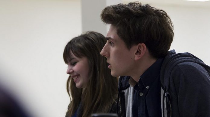 Bethany Heemskerk and Matthew Finlan, who perform in the leading roles of Emily Webb and George Gibbs, during a cast read-through of Our Town (photo: Lindsay Unterlander / Adam Martignetti)