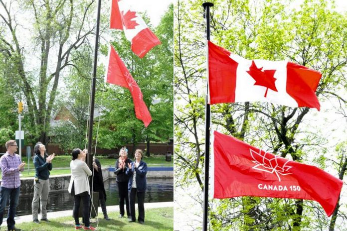 The raising of a new Canadian flag and Canada 150 flag at Lock 32 in Bobcaygeon. (Photos: Bruce Hobley)
