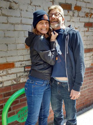 Married couple Tamara Bick and Drew Antzis, who run a comedy production company, relocated to Peterborough from Los Angeles to be closer to Tamara's family.  (Photo: Sam Tweedle / kawarthaNOW)