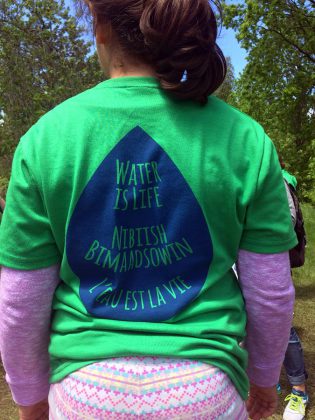 This year, Water Festival t-shirts featured three languages including Nibiish Bimaadsowin in Ojibway, meaning Water is Life or L'eau eat la vie in French. Over the last six years, the festival has integrated more indigenous knowledge into activity centres and workshops to help students understand their essential relationship to water and to the earth, through traditional teachings. (Photo: Karen Halley)