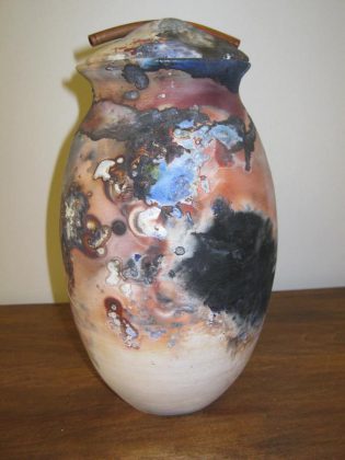  Gail West created this lidded container using an outdoor smoke firing method, where the pottery is fired in a container or hole in the ground using organic materials, which results in this interesting patina. (Photo courtesy of Gail West)