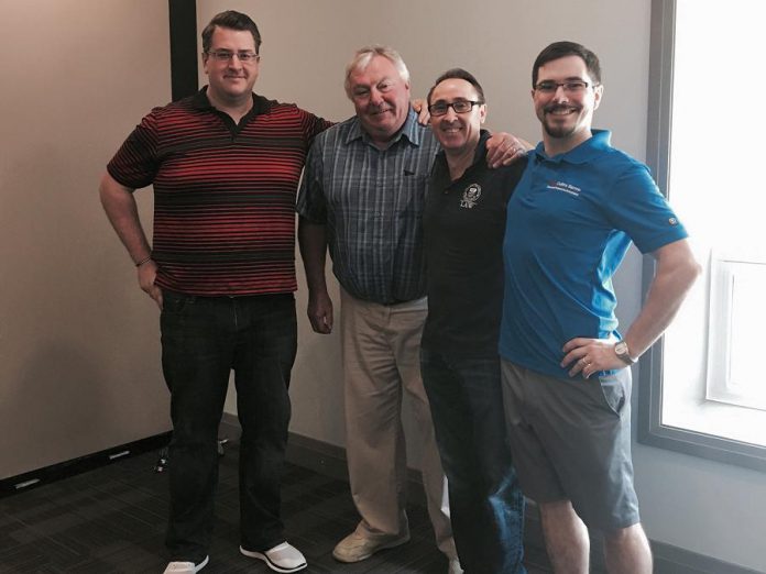 Lawyers Ian Keay, Robert McGillen, Oliver Cooper, and Rob Hiseler check out their new office space on Brock Street.