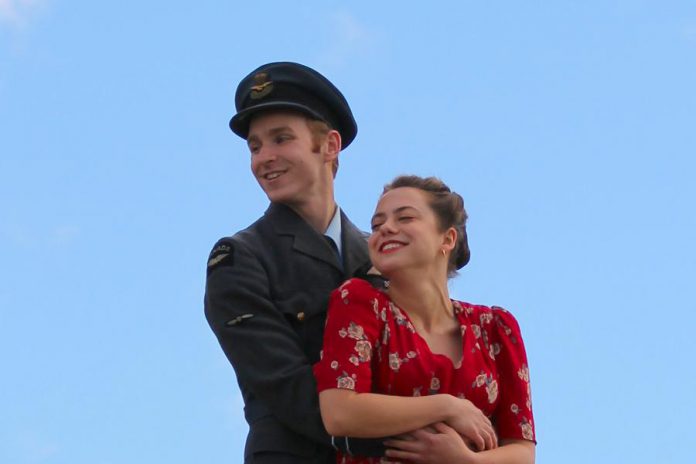Actors Michael Cox and Shaina Silver-Baird, who portray heavy bomber pilot Peter Benton and his love interest Emma, pose at a media event at Winslow Farm in Millbrook on June 21. (Photo: Caitlin McGill / 4th Line Theatre)