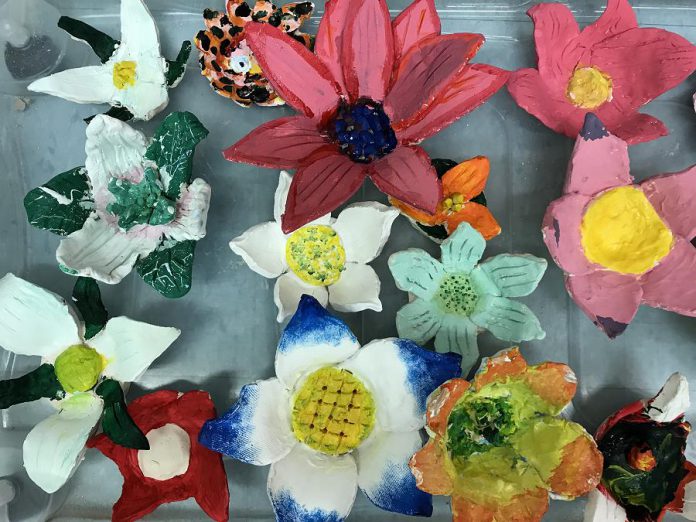 Students from St. Catherine Catholic Elementary School in Peterborough have created and colourfully painted 150 clay flowers representing provincial flowers from across Canada. The exhibit is one of four student art exhibits that will be on display during Peterborough's four-day Canada 150 celebration from June 29 to July 2. (Photo: Canada 150th Committee)