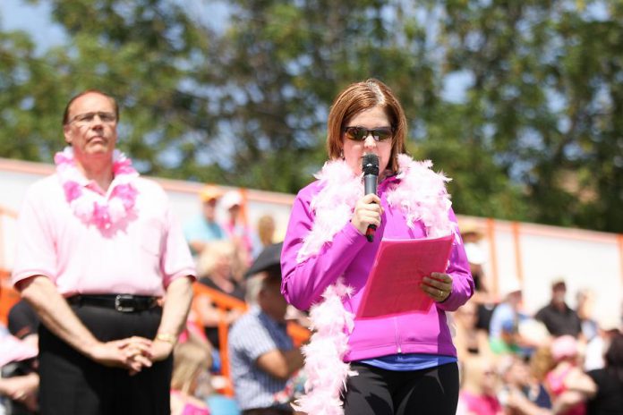 Peterborough Mayor Daryl Bennett looks on as the names of those who have lost their cancer battle are read at the 2015 Peterborough's Dragon Boat Festival.