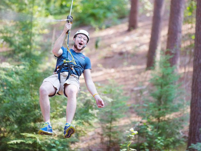 You can trek from tree to tree on fun games like suspended bridges, Tarzan swings, swinging logs, cable traverses, and of course, zip lines.  (Photo: Treetop Trekking Ganaraska)