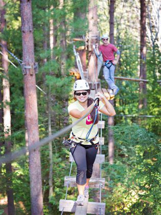 A guide will give you a safety orientation where they will explain the rules of the park, show you how to safely use your equipment, and watch you complete an orientation course. Once you understand all the rules you can progress through the rest of the park at your own speed, under the watch of ground and aerial guides.  (Photo: Treetop Trekking Ganaraska)