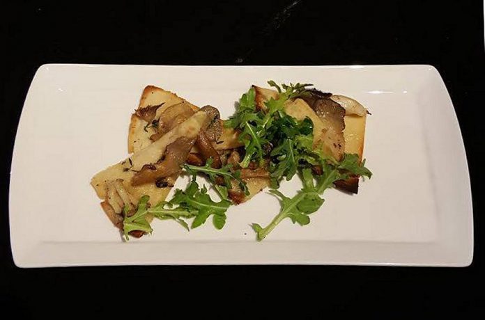  Flatbreads have become a popular pick on the  Hunter County Cuisine and Wine Bar menu. This one is made with mushrooms from Waymac Farms. (Photo: Kyle Wagenblast)