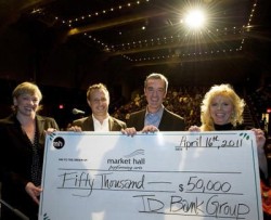 Jamie and his colleague Anthony Kellner present a cheque for $50,000 from TD Bank to Karen August (far left) and Siobhan Tremblay of Market Hall (photo: Clifford Skaarstedt Jr.)